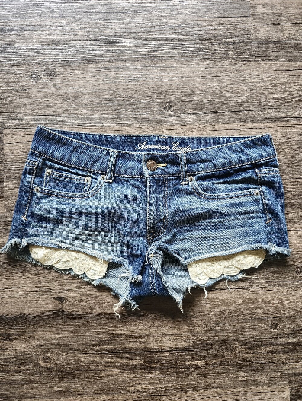 American Eagle Outfitters Blue Denim Shorts with Cream Lace Trim Pockets
